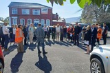 People receiving a safety briefing