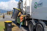 Recycling truck picking up a wheelie bin of recycling